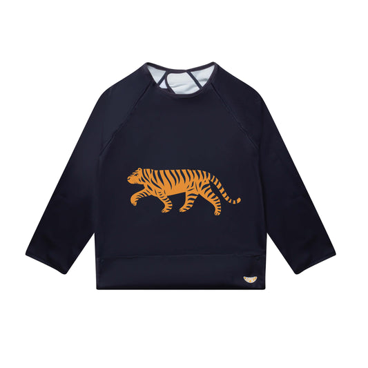 Apri Reusable Disability Bibs: Stylish dark blue long-sleeves for kids, teens, and adults. Tiger graphic and convenient food pocket included