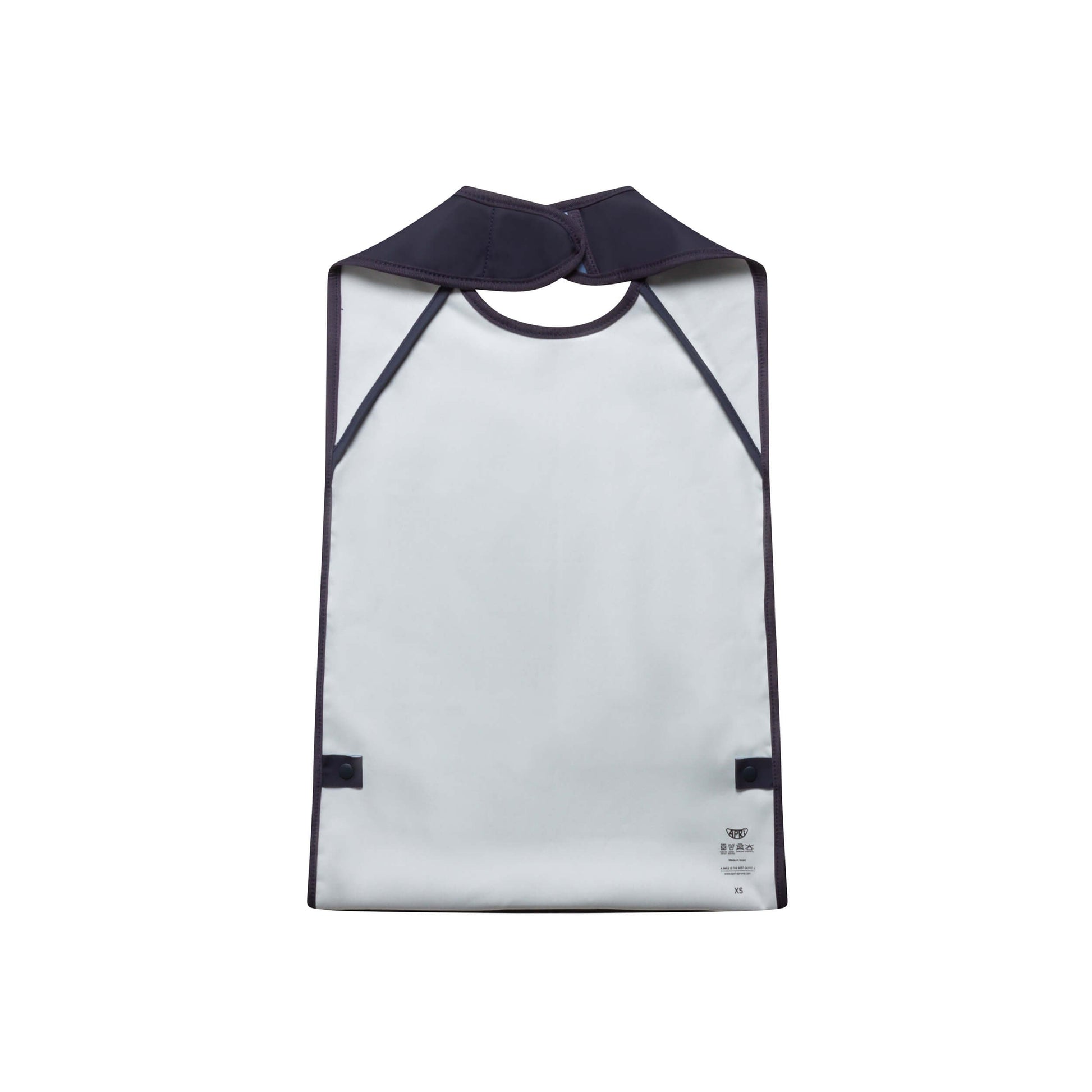 Waterproof bib for kids, teens and adults with disabilities. Dark blue sleeveless Apri bib with food pocket and innovative fastener