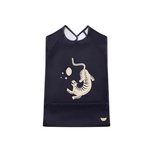 Apri bib for kids, teens and adults with disabilities. Dark blue sleeveless with leopard design and handy food collection pocket